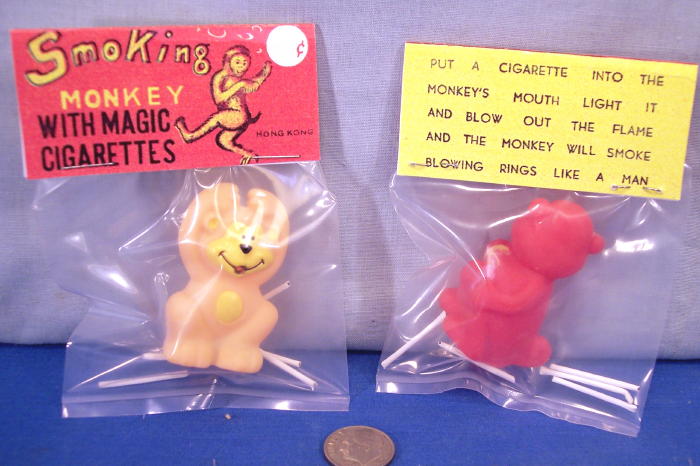 Smoking monkey toy top